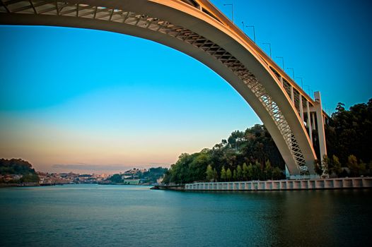 Oporto bridge at beautiful sunset.