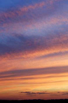 Photo of a beautiful dramatic sky as the sun disappears below the horizon.