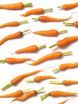 close up of baby carrots on white