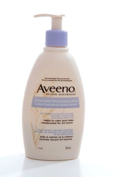 Aveeno moisturising beauty body lotion with colloidal oatmeal, lavendar, chamomile and ylang-ylang oils