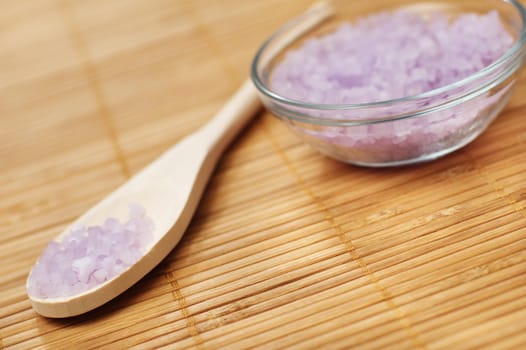 Bath salt on display against a bamboo mat.