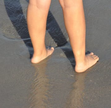 Feet in the sand