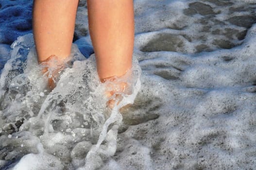 Feet in the sand