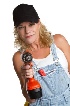 Isolated woman using power tools