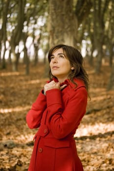 Portrait of a beautiful young woman thinking in something