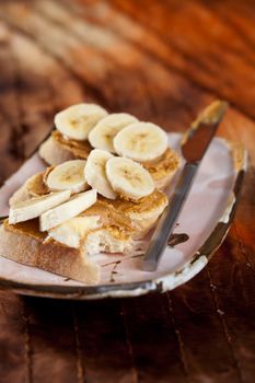 Delicious peanut butter sandwich with banana