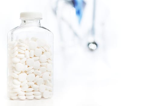 Doctor with medical supplies against a white background.