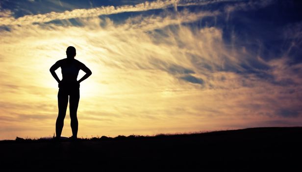 Beautiful young woman runner having a workout session.