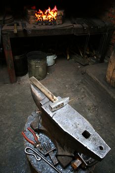 Hammer and anvil in an old smithy