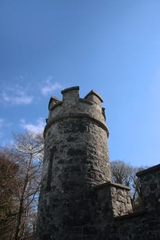 an old ancient tower on the shannon river in ireland