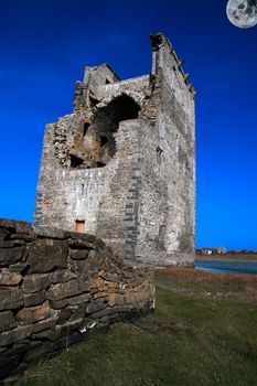 an old ancient castle on the shannon river in ireland