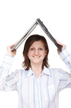 smiling young woman holding notebook over head