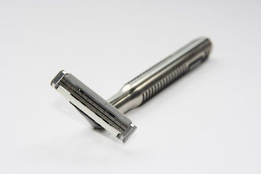 A shaving razor isolated in background