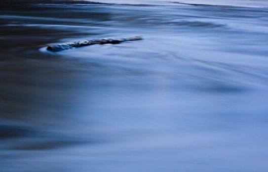 abstract image with blurs of the water and light