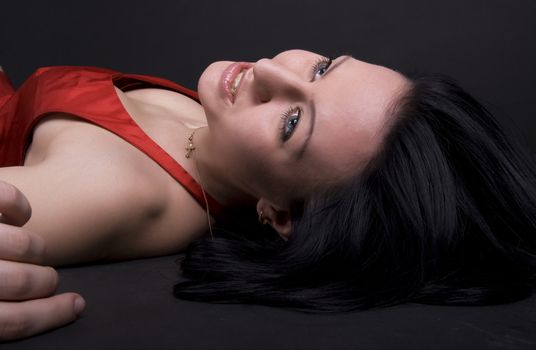 Portrait of a young beautiful brunette relaxing