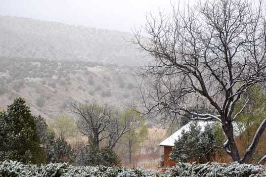 Winter cabin in the mountains