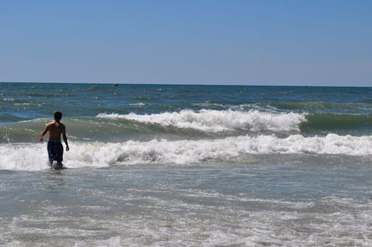 Boy in waves