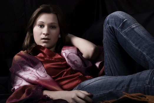 Portrait of a young beautiful brunette posing