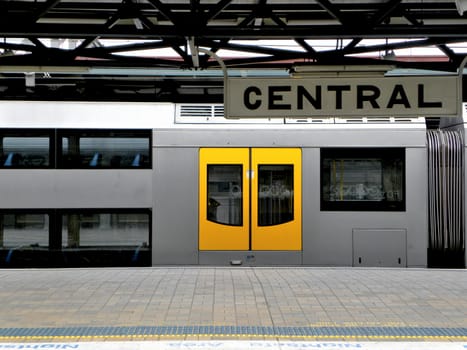 Photo shows part of train. Photo taken at the station.