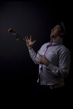  young man with a rose as a concept of romance 