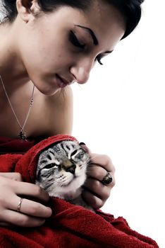 young beautiful brunette taking care of the cat