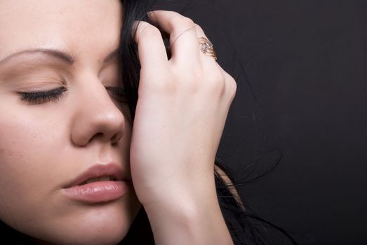 Portrait of a young  brunette being tired