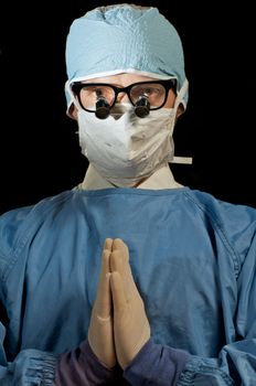 Surgeon praying for good result