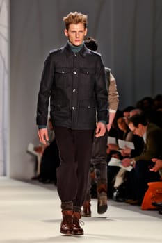 NEW YORK - FEBRUARY 11: Model walks the runway for the  Perry Ellis collections Mercedes-Benz Fashion Week at Lincoln Centre on February 11, 2011 in New York.