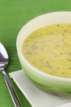 Bowl of cream of broccoli soup. 
