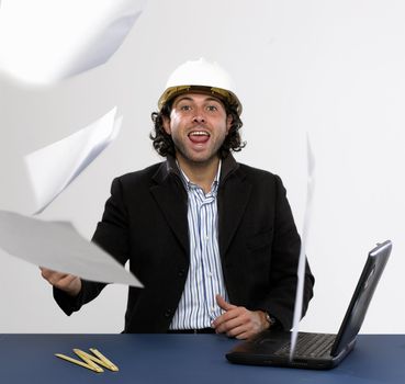 Young architect at work with laptop