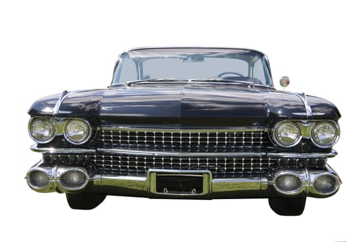 A shiney, mid-sixties black classic automobile viewed from a low angle, isolated on a white background.