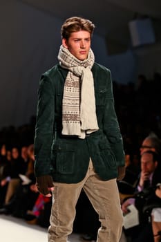 NEW YORK - FEBRUARY 11: Model walks the runway for the  Perry Ellis collections Mercedes-Benz Fashion Week at Lincoln Centre on February 11, 2011 in New York.
