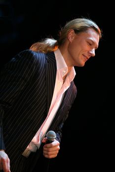RUSSIA, MOSCOW - 23 DECEMBER: Concert of group Russian group "Dynamite" On a photo the participant of group Ilya Danil'chenko 23 december, 2006 in Moscow