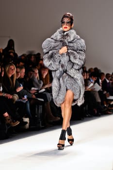 NEW YORK - FEBRUARY 11: Model walks the runway for the  Farah Angsana collections Mercedes-Benz Fashion Week at Lincoln Centre on February 11, 2011 in New York.