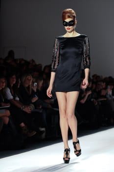 NEW YORK - FEBRUARY 11: Model walks the runway for the  Farah Angsana collections Mercedes-Benz Fashion Week at Lincoln Centre on February 11, 2011 in New York.