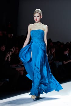 NEW YORK - FEBRUARY 11: Model walks the runway for the  Farah Angsana collections Mercedes-Benz Fashion Week at Lincoln Centre on February 11, 2011 in New York.