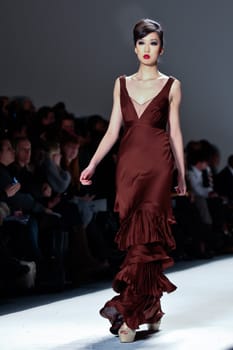NEW YORK - FEBRUARY 11: Model walks the runway for the  Farah Angsana collections Mercedes-Benz Fashion Week at Lincoln Centre on February 11, 2011 in New York.