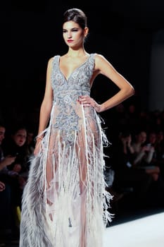 NEW YORK - FEBRUARY 11: Model walks the runway for the  Farah Angsana collections Mercedes-Benz Fashion Week at Lincoln Centre on February 11, 2011 in New York.
