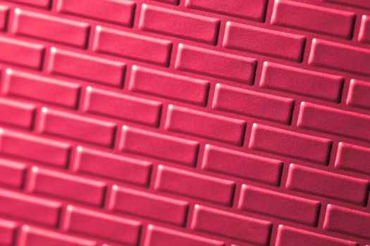 A wall formed by metal bricks