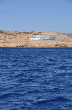 national flag on a greek island (defensive territory from Turkey invasions)