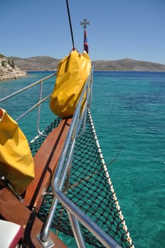 beautiful front view of a cruising boat in Greece waters