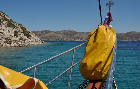 beautiful front view of a cruising boat in Greece waters