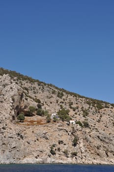 traditional houses in Kalymnos island, Greece (blue sky)