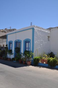 greek house with lovely flowers in Kalymnos island, Greece