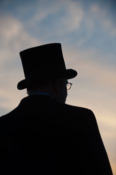 silhouette of man in top hat