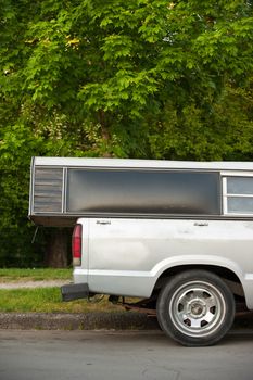 side view of mix-matched truck and canopy
