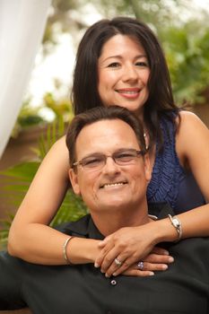 Happy Attractive Hispanic and Caucasian Couple Portrait.