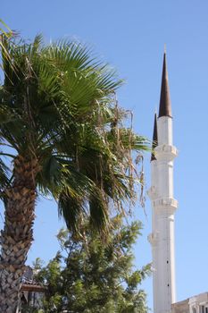 Minaret Muslim Mosque Turgutreis Turkey Clear blue sky