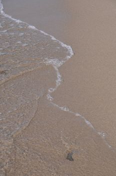 gorgeous beach sand and sea foam (copy-space available)