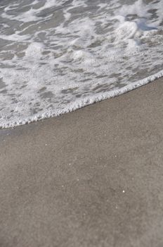 gorgeous beach sand and sea foam (copy-space available)